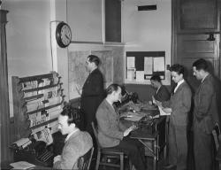 Image of journalists in the Radio-Canada/CBC newsroom in Montreal, Canada