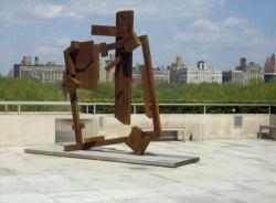 Joel Perlman sculpture Square Tilt framed by city skyline